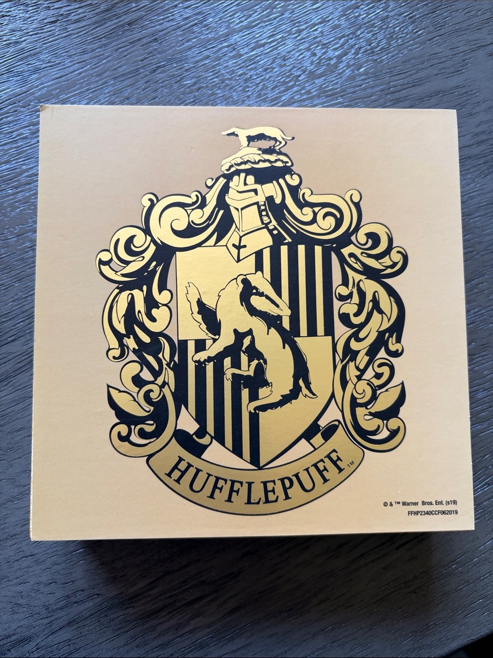 Warner Bros. Hufflepuff Crest in Yellow and Black